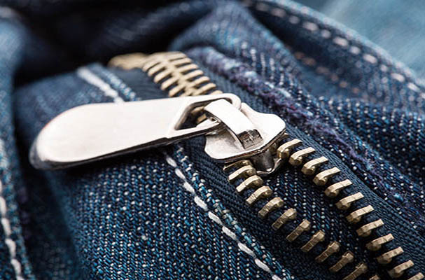 Zip and equipment on table. Zip and leather repairing equipment on the table.